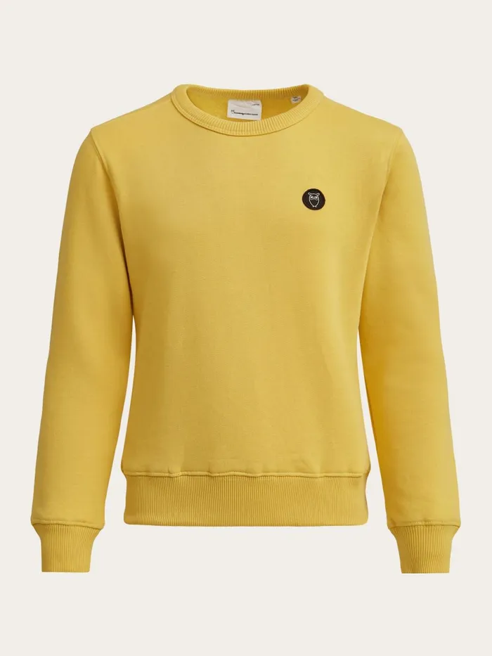 KnowledgeCotton Apparel Sweatshirts Badge Crew Neck Sweat Misted Yellow 8211 Kids KnowledgeCotton Apparel Sweatshirts Badge Crew Neck Sweat Misted Yellow 8211 Kids