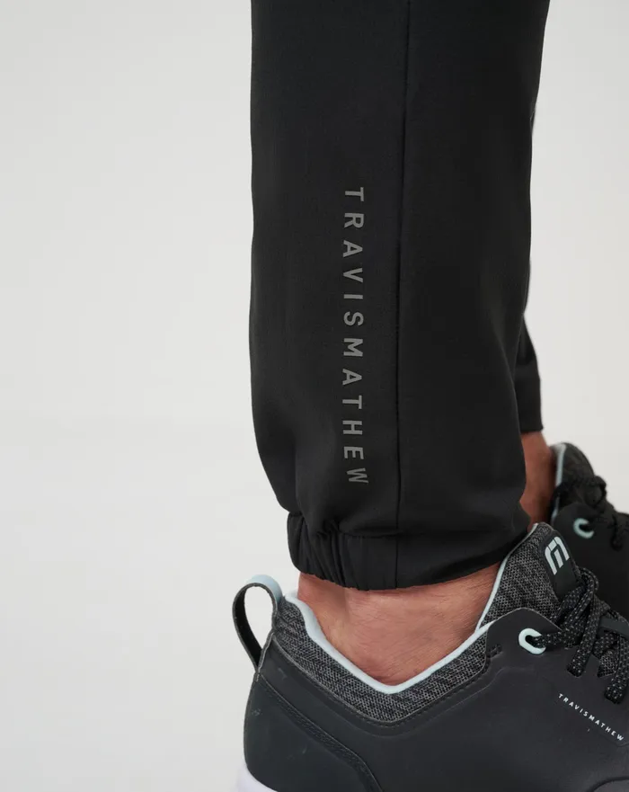 Men Pants TravisMathew OPEN TO CLOSE JOGGER Black