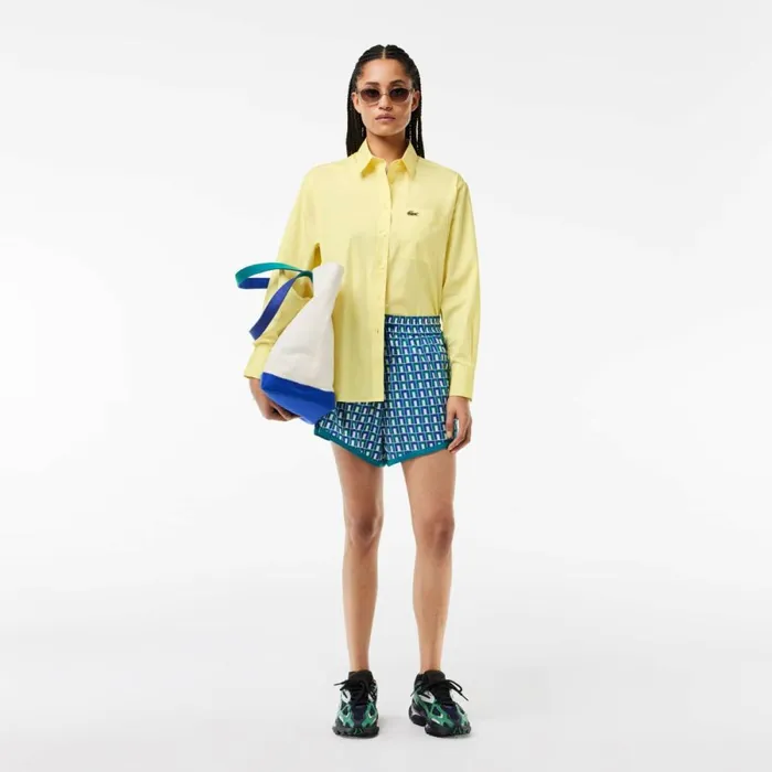 TShirts and Tops Women Lacoste Women039s Oversized Fit Cotton Poplin Shirt Pastel Yellow 107